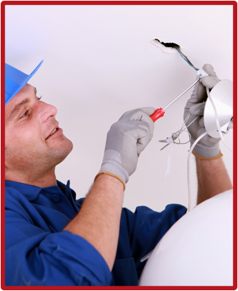 Electrician Installing a Ceiling Fixture